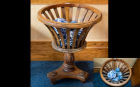 A Wooden Georgian Style Jardiniere Stand. Contains A Collection Of Blue And White Carpet Bowls.