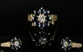 Ladies - 1970's 9ct Yellow Gold Sapphire and Diamond Set Dress Ring. Flower head Design. Full