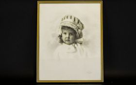 A Vintage Photographic Portrait Of Female Infant Framed and mounted under glass, black and grey