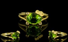 Peridot and White Topaz Accented Prong Ring, a 2.