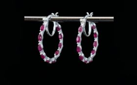 Ruby Hoop Earrings, marquise cut rubies of good colour, totalling 2.25cts, set in a single row to