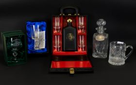 A Miscellaneous Lot Of Glass Items Comprising a cased decanter and four glasses,