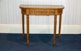 A Modern Yew Wood Console Table Comprising single frieze drawer above barley twist supports. 29