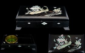 Oriental Footed Inkwell/Brushbox Black lacquered box with mother of pearl inlay to top in bird and