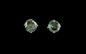 Green Sapphire Solitaire Stud Earrings, solitaires totalling .