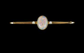 Antique Period - Excellent 15ct Gold Brooch, Set with Cabochon Cut Opal to Centre, The Oval Shaped
