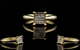 Ladies 9ct Gold Four Stone Diamond Ring The four square shaped cut diamonds of excellent colour and