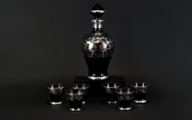 Glass Decanter And Shot Glasses Decorative decanter of specimen flask form in amethyst glass