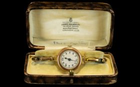 Ladies 1920's 9ct Gold Round Mechanical Watch With attached 9ct gold expanding bracelet,