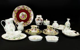 A Mixed Lot Of Ceramics To include Wedgwood 'Rosehip' trinket dishes, vases, water jug etc.