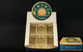 A Boxed Set Of Original 1970's Babycham Glasses Six gilt trim small perry saucers with faun logo to