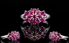 Ladies - Contemporary Design Silver Cluster Ring, Set with Rubies.