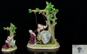 Sitzendorf Early 20th Century Hand Painted Porcelain Figure Group ' Young Girl on a Swing with Male
