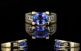 Contemporary and Stunning 14ct Yellow Gold Claw and Channel Set Bespoke Tanzanite and Diamond