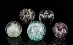 A Collection Of Blown Glass Paper Weights.