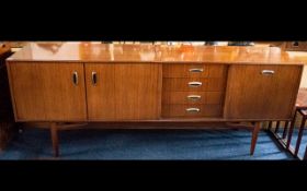 G Plan Sideboard Typical Form, Fall Front, Four Drawers And A Cupboard, Raised On Turn Legs.