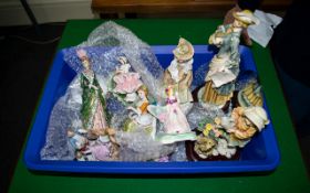 A Collection Of Assorted Pottery Including Mainly Lady Figurines, Modern And Vintage.