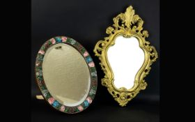 Two Small Mirrors Comprising a shaped mirror in the Empire style with acanthus and scroll border,