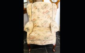 A Modern Wing Back Arm Chair Generously proportioned chair with queen anne legs,
