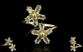 Green Sapphire Double Flower Ring, marquise cut green sapphires, five to each flower,