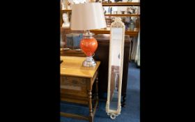 Modern Decorative Table Lamp orange bulbous stem on chrome circular base with sheer ivory coloured