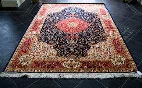 A Very Large Woven Silk Carpet Keshan rug with midnight blue ground and traditional Middle Eastern