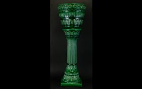 A Floor Standing Ceramic Jardiniere Raised on decorative pillar,