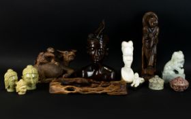 A Mixed Lot Of Oriental African And Carved Wood Items To include a root wood Water buffalo,