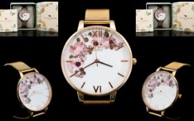 Olivia Burton Marble Floral Rose Gold Mesh Watch. Model OB16C506.