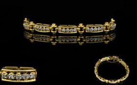 14ct Gold Articulated Link Diamond Set Bracelet Each link consisting of five round brilliant cut