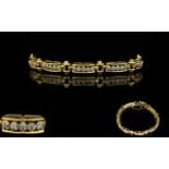 14ct Gold Articulated Link Diamond Set Bracelet Each link consisting of five round brilliant cut