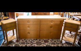 Chest Of Drawers Raised on plinth base with two banks of three graduating drawers.