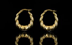 Ladies 9ct Gold Pair of Hoop Earrings. Marked 9ct.