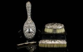 Elizabeth II Ladies Embossed Silver 4 Piece Vanity Set. Includes Brushes and Comb ( 4 ) Pieces.
