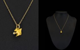 A 9ct Gold Pendant Drop In The Form of a Squirrel, Attached to a 9ct Gold Trace Chain.