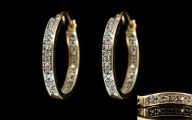 10ct Gold - Attractive Pair of Hoop Earrings Set with Diamonds ( 40 ) Est Diamond Weight 0.40 pts.