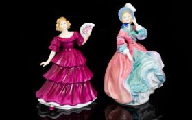 Two Royal Doulton Figures The first 'Spring Morning; HN 1922, secondly, 'Pretty Ladies,