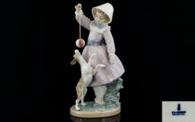 Lladro Porcelain Figure ' Teasing The Dog ' Model No 5078. Issued 1980 - 1985. Height 10.