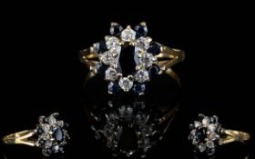 Ladies 9ct Gold Sapphire And Diamond Cluster Ring. Flower head design.