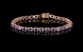 Rose de France Amethyst Tennis Bracelet, oval cuts, totalling 12cts,