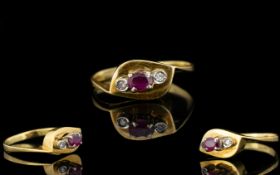 18ct Gold - Attractive Ruby and Diamond 3 Stone Dress Ring.