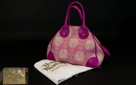 Vivienne Westwood Pink Orb Jacquard Yasmin Tote Bag Top handle handbag in all over woven orb design