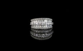 A CZ And Platinum Plated Silver Dress Ring Art Deco style statement ring set with three rows of