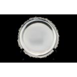 Edwardian Period Small Silver Salver Of cylindrical form with embossed scrolling edge.