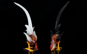 A Pair Of Murano Glass Cockerels Two miniature glass birds each with heads lowered and exaggerated