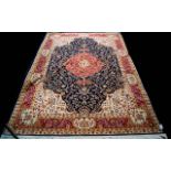 A Large Woven Silk Carpet Keshan carpet on blue ground with navy, red,