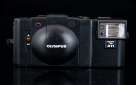 Olympus XA2 Range Finder 35 mm Compact Film Camera with Detachable Flash.