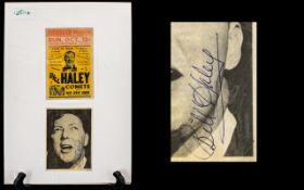 Bill Haley Autograph on a picture displayed below a concert poster photograph.