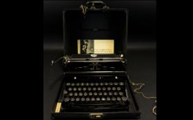 Royal Portable Typewriter. Comes With Key. Hard Case. Overall Good Condition.