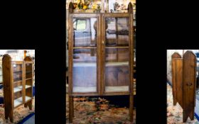 An Arts & Crafts Golden Oak Display Cabinet.